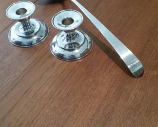 Sterling Silver table articles:
Pair of Sterling Silver Candle Holders & Sterling Silver ladle. Marked Dublin c. 1800 "JB"