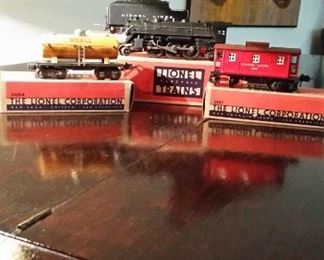 Lionel Train Set pre War: With original boxes.
Locomotive #244E
Shell Oil Tanker #2654
Caboose # 2657
Tender #2224W