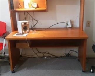 Computer Desk in a classic Teak finish with a Danish Modern Style.