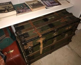 Many trunks and vintage suitcases