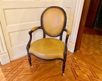 French armchair with leather upholstery