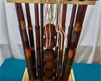 Lot 54
Vintage Wooden Croquet Set: 6 Mallets, 5 Balls, 9 Wire Wickets, 2 Stakes, Holder