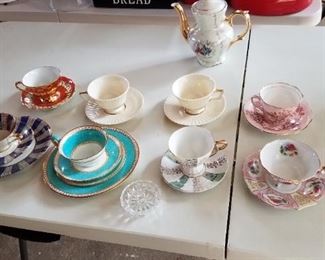 Various tea cup and saucer sets, tea pot, glass ring holder