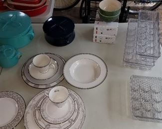 Egg storage containers, Dansk Kobenstyle pots and trivet lids, various pieces of china, Staub overware bowls