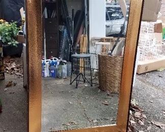 Large copper framed mirror