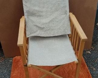 Director's chair and small orange wool rug