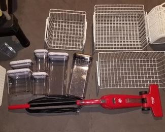 Oxo containers (various sizes), Dirt Devil stock vacuum, wire under-shelf storage shelves (various sizes), storage baskets