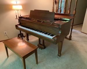 Kawai walnut baby grand piano. (5' long) with bench.