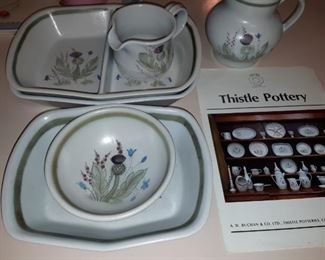 Partial set of thistle pottery dishes