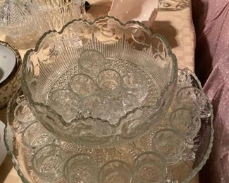 large punch bowl with 24 glasses