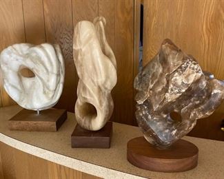 Three stone sculptures