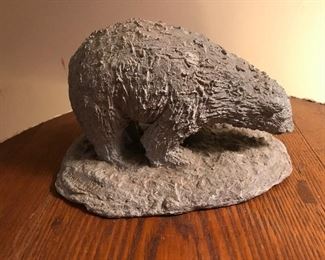 Folk art cement bear signed Hickey