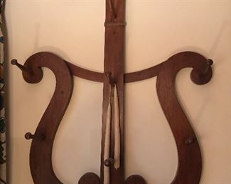 Antique cherry harp shaped wall coat rack