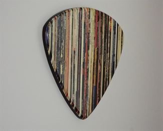 Ends of Album covers used to create guitar pick wall art