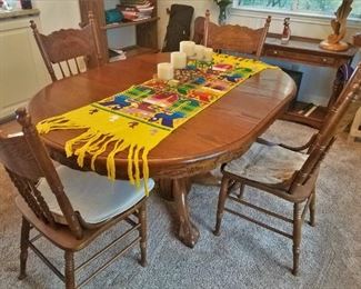 Oak dining table and chairs