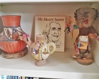 Native American pottery, book, and kachina