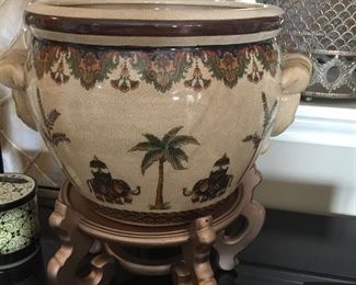 Elephant motif planter on stand