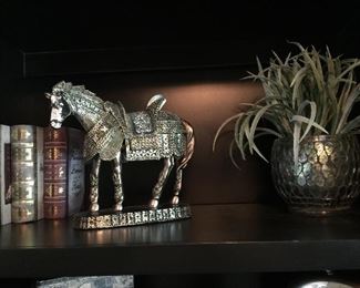 Silver horse and plant
