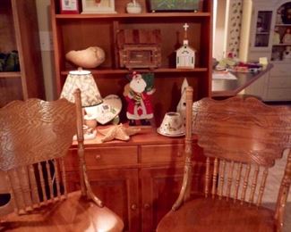 Oak Pressed Back Swivel counter stools in front of wonderful small scale hutch (will provide great storage)