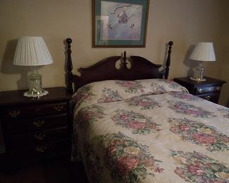 Sumter Cabinet (Korn) queen sized short post bed and two 4 drawer nightstands.