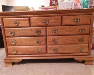 Nine drawer colonial dresser - part of another bedroom suite.