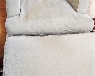 A. Rudin Swivel Chair and Ottoman