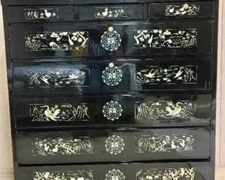 Asian dresser with Mother of Pearl inlay offered by Susie’s Key West Estate Sales