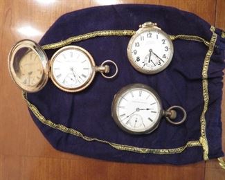 Pocket watches. Two open and one closed hunting case