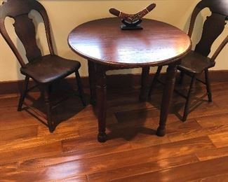 sweet children's antique table with carved back chairs