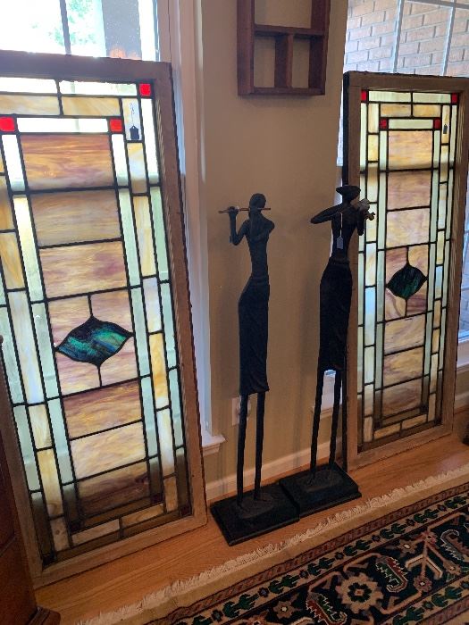 2 large stained glass windows and cast iron musical statues