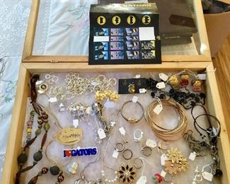 Jewelry and postage stamps
