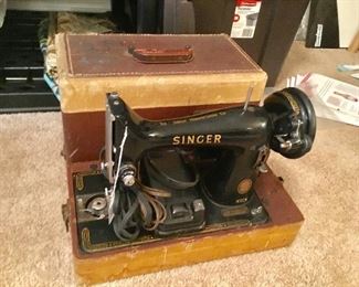 Old Singer sewing machine with case. 