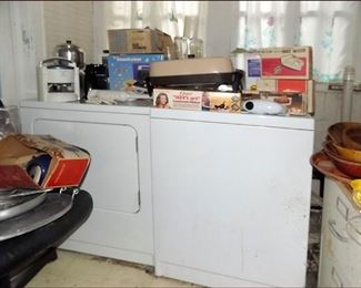 Washer and Dryer with Lots of Unopened Vintage Small Kitchen Appliances.