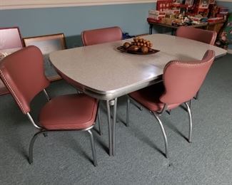 Vintage table and chairs. Chairs have been redone