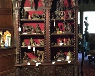 Fabulous gothic cabinet and shows some of the many bronze and other metal figures to choose from. 