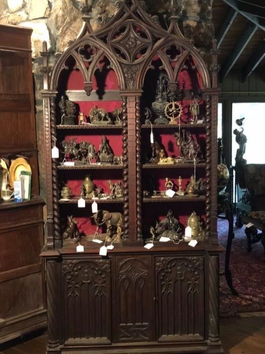 Fabulous gothic cabinet and shows some of the many bronze and other metal figures to choose from. 