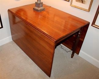 ONLINE AUCTION ITEM #14 - Drop-leaf table - approximately 92" long including leaves, 26.5" wide.
