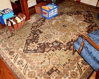 ONLINE AUCTION ITEM #25 - Brown area rug - approximately 7.75 feet x 10.75 feet.