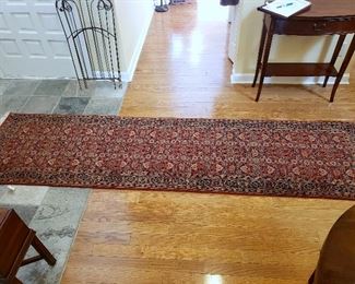 ONLINE AUCTION ITEM #51 - Red Oriental runner - approximately 10'5" x 2'7".