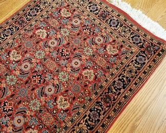 ONLINE AUCTION ITEM #51 - Red Oriental runner - approximately 10'5" x 2'7".