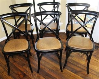 Six cross back woven bottom chairs.  These chairs would work with many different dining tables!