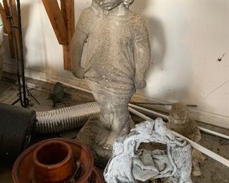 Old concrete statue of a young girl. 36 inches tall