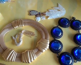 More WOW jewelry, including the mermaid pin and the mother of pear fish at top.