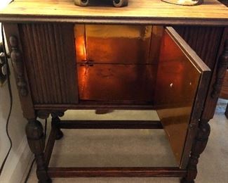 Smokers cabinet with copper lined tobacco storage