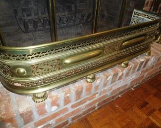 Ornate brass fireplace surround