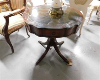 Leather top solid mahogany table with brass feet & custom glass top 