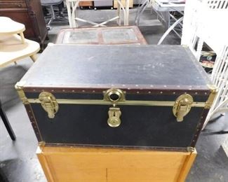 Black chest with brass hardware