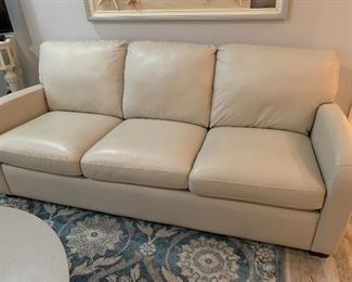 Palliser Leather sleeper sofa and loveseat less than 2 years old in new condition.