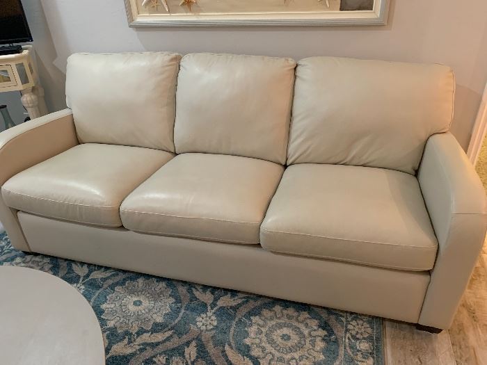 Palliser Leather sleeper sofa and loveseat less than 2 years old in new condition.
