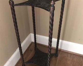 Metal plant stand with shelf